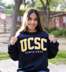 Campbell Scholar proudly wearing her college sweatshirt