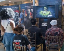 Visitors watch videos that lay bare the barbaric history of psychiatry and its equally inhumane practices of today.
