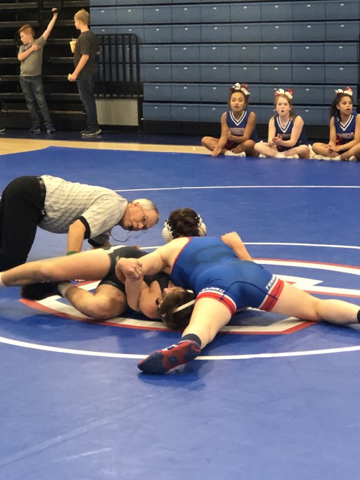 Check Into Cash Owner Allan Jones Sponsors Cleveland Middle School Wrestling, Praises Its First and Undefeated Female Wrestler