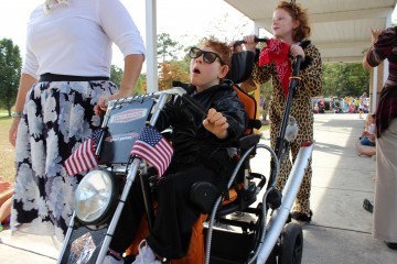 "Harley dude" Timmy rides by for the Codington/101 Mobility parade.