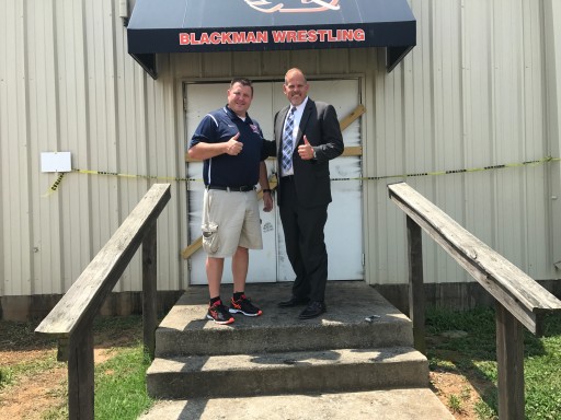 Check Into Cash Donation Helps Rebuild Wrestling Facility