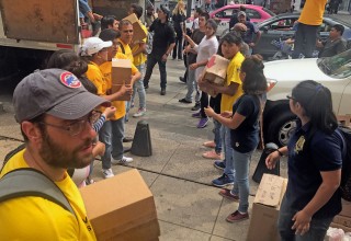 Distributing supplies collected by the Church of Scientology 