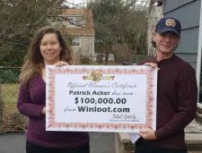 Patrick Acker showing off the Big Check!