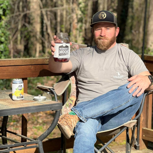 Junior Johnson's Midnight Moon Teams Up With NASCAR Driver Jeffrey Earnhardt as Official Moonshine Partner