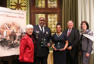 Recipients of 2017 Humanitarian Awards, Officer Arthur Douglas, and Ms. Andrea James (second and third from left) Oct. 24 at the Church of Scientology National Affairs Office in Washington, D.C.