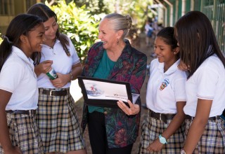 Dr. Mary Shuttleworth (center), president of Youth for Human Rights International, with young human rights advocates in Santa Cruz, Costa Rica