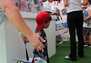 Boy Shopping at Back-to-School Event