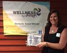 Birdy Dahl accepts Wellness by Design Award for DriSteem