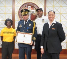 Mr. Juan Gutierrez. Executive Director of La Academia Mundial Bomberos (World Academy of Firefighters) is presented the Community Leadership Award by the Church of Scientology Harlem.