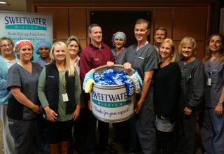 OrthoAtlanta Surgery Center Austell and Southern Medical Linen Service announce Sock Donation Program for Sweetwater Mission, Austell, Georgia