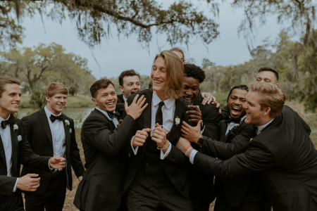 NFL star Trevor Lawrence with his groomsmen in INDOCHINO at his wedding to Marissa Mowry Lawrence.