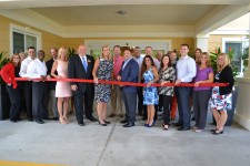 CEO, Richard J. Hutchinson, and senior management from Discovery Senior Living, cut the ribbon at Discovery Village at The Forum