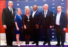 Our team accepting the award at the Radisson Hotel Group conference.