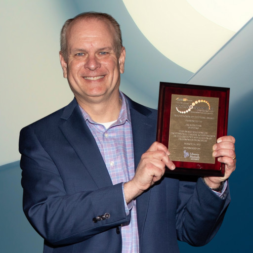 Jim Mecham Receives Practitioner of the Year Award