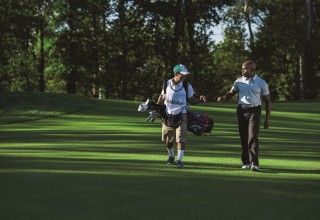 CaddieNow customer and caddie on the golf course