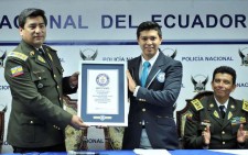 The Guinness World Record representative for Latin America presented a certificate to the National Ecuador Police for the record-breaking number of individuals signing their drug-free pledge.
