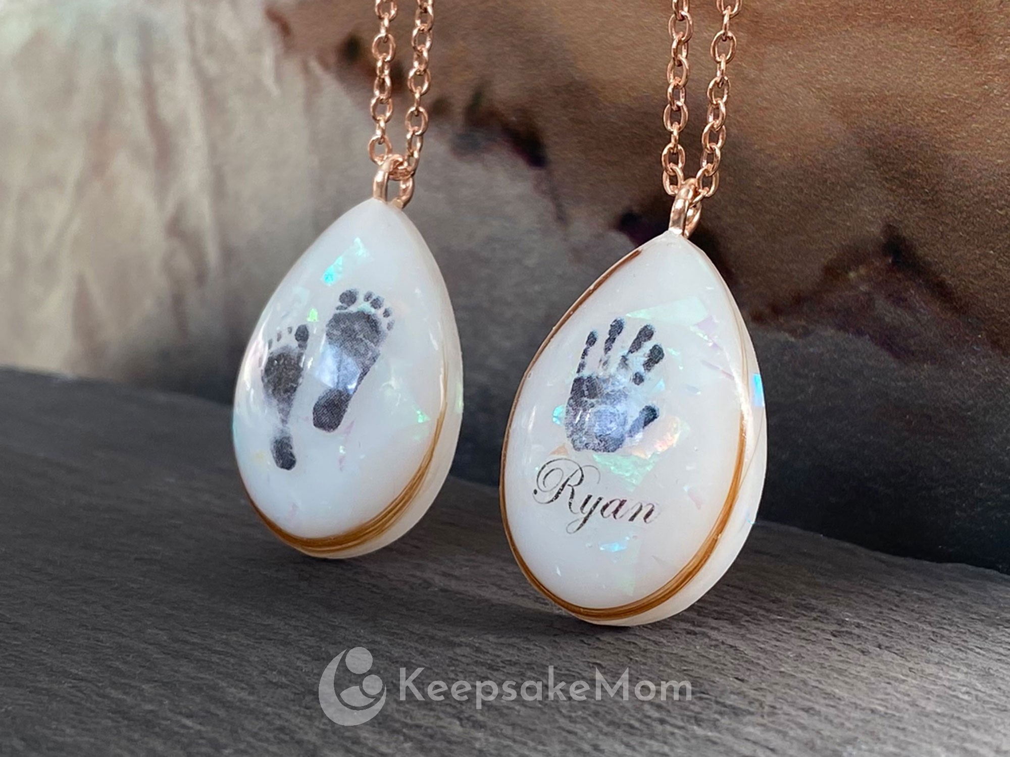 KeepsakeMom Adds Stunning Angel Prints Necklace to Breastmilk