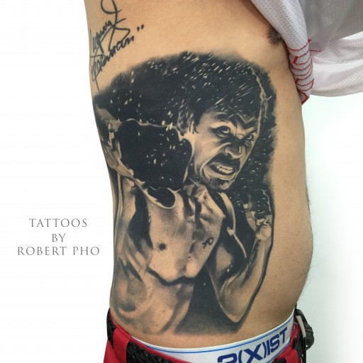 Does man who tattooed Manny Pacquiao on his stomach regret his decision after the loss?