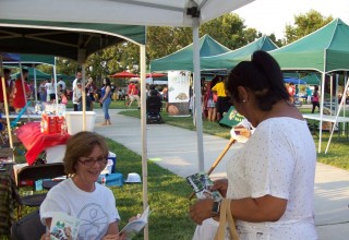 Volunteers from the Church of Scientology Sacramento at The Way to Happiness booth at the Robla Community Parks National Night Out