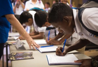 Students sign in at the Youth for Human Rights seminar in Santa Cruz, Costa Rica.