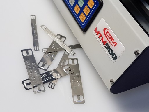 CIM is Proud to Introduce a New Solution for the Embossing of Marker Plates and Tags Used in Permanent Identification Applications