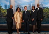 MR. DAVID MISCAVIGE, Chairman of the Board Religious Technology Center and ecclesiastical leader of the Scientology religion, with (left to right): Mr. Orlando Johnson, Director of Agape Community Education and Resource Center; Georgia State Senator Donzella James; Ms. Pamela Perkins Carn, Executive Coordinator, Interfaith Children's Movement of Atlanta; and Rev. Dr. James Milner, Founder and Executive Director of Community Concerns Inc.