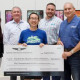 Earnhardt Genesis Retailers Proud to Present a Large Donation to Free Arts Phoenix