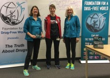 Foundation for a Drug-Free World volunteers (in aqua shirts and jackets) at a drug education program presented to students at Resurrection Catholic Secondary School in Waterloo, Ontario.