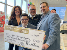 Arlington Nissan Donates to Local Charity for Down Syndrome