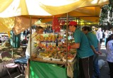 Bringing copies of The Truth About Drugs booklets to a fruit and chili stand in São Paolo, Brazil