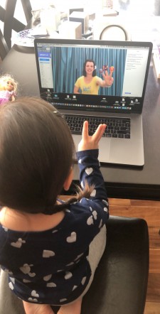 Little lovebug singing along with her Magical Music Educator in a LoveBug & Me Online Music Class.