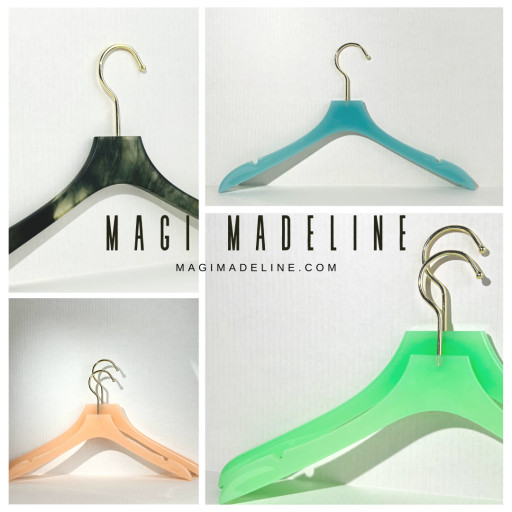 Black-Owned Luxury Brand Magi Madeline Launches Lucite Garment Hanger Line