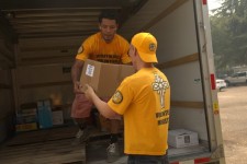 Loading a truck with needed supplies.