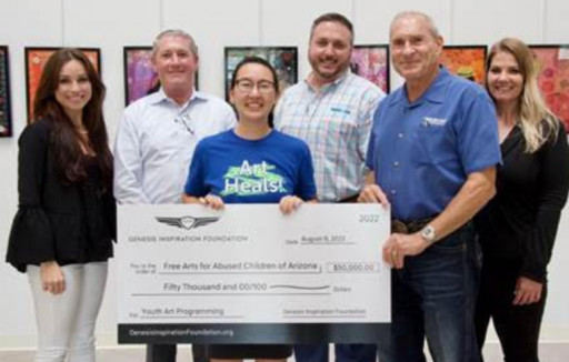 Earnhardt Genesis Retailers Proud to Present a Large Donation to Free Arts Phoenix