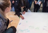 Students signed a pledge signifying their commitment  to combating discrimination—a factor underlying most  cases of bullying.