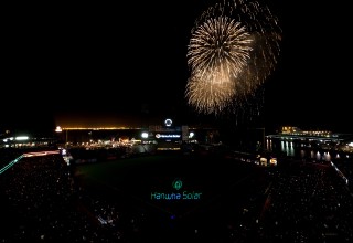 Fireworks and Projected Laser Graphics to Music at Stadium Event
