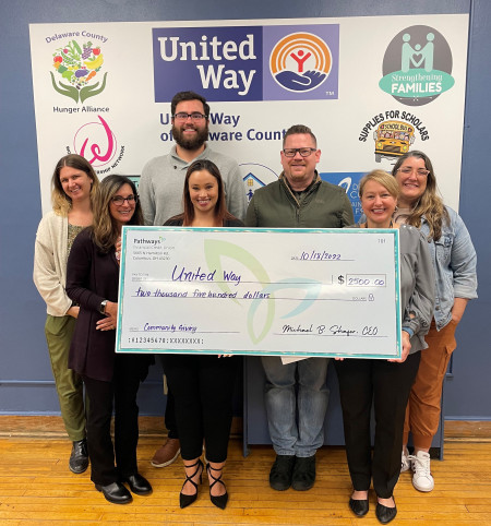 Pathways Credit Union presents $2,500 check to United Way Delaware County for essential supplies.