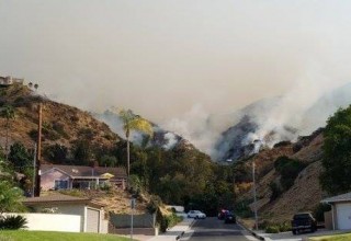 The La Tuna fire, moving across the hills