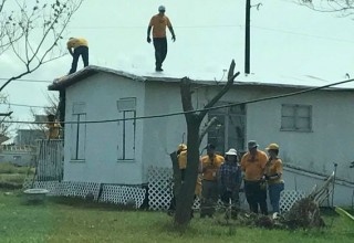 Scientology Volunteer Ministers, cleaning up the hurricane damage in Aransas County, Texas
