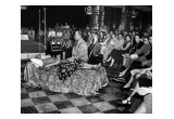 A photo of L. Ron Hubbard demonstrating auditing (spiritual counseling) techniques in the early days of Dianetics and Scientology.