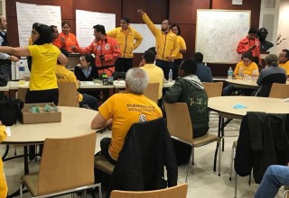 At the Church of Scientology Mexico City Scientology Volunteer Ministers Latin America Coordinator assigns Volunteer Ministers and Los Topos to disaster sites.