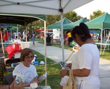Volunteers from the Church of Scientology Sacramento at The Way to Happiness booth at the Robla Community Parks National Night Out