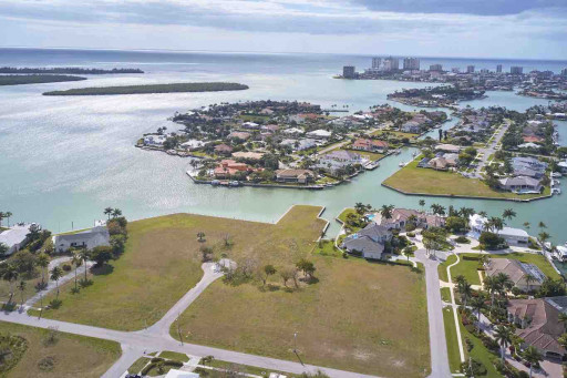 $10.749 MILLION WATERFRONT PROPERTY IS HIGHEST-PRICED LOT SALE IN THE HISTORY OF MARCO ISLAND - AND THE SECOND-HIGHEST RESIDENTIAL SALE