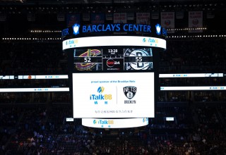 iTalkBB's logo and the Nets' logo displayed on the center hung