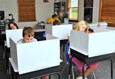 Students using the 13" tall desktop study carrel.