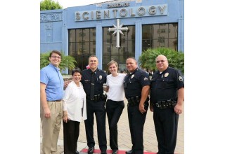 Captain Art Sandoval (third from the left) and officers from the Northeast LAPD at the Church of Scientology Los Angeles on National Night Out
