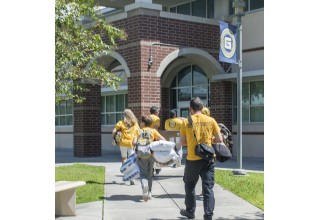 Scientology Volunteer Ministers bring supplies to the shelter at Gibbs High School in St. Petersburg, Florida.