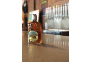 A creative partnership between two Kentucky brands, Chicken Cock Whiskey and Goodwood Brewing